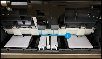 Cleaning the paper feed rollers