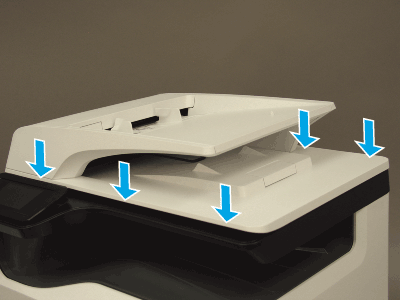 Push down on the document feeder