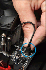 Disconnecting the processor fan power cable from the system board