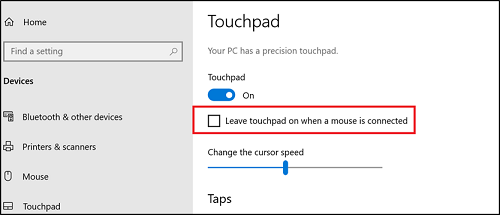 Clearing the Leave the touchpad on when a mouse is connected check box in Windows 10