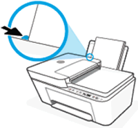 Sliding the paper guide in